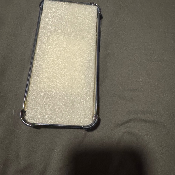 Clear Phone Case with Blue Accents For a 15 Pro Max. Spinning wheel in Center. - Picture 13 of 14